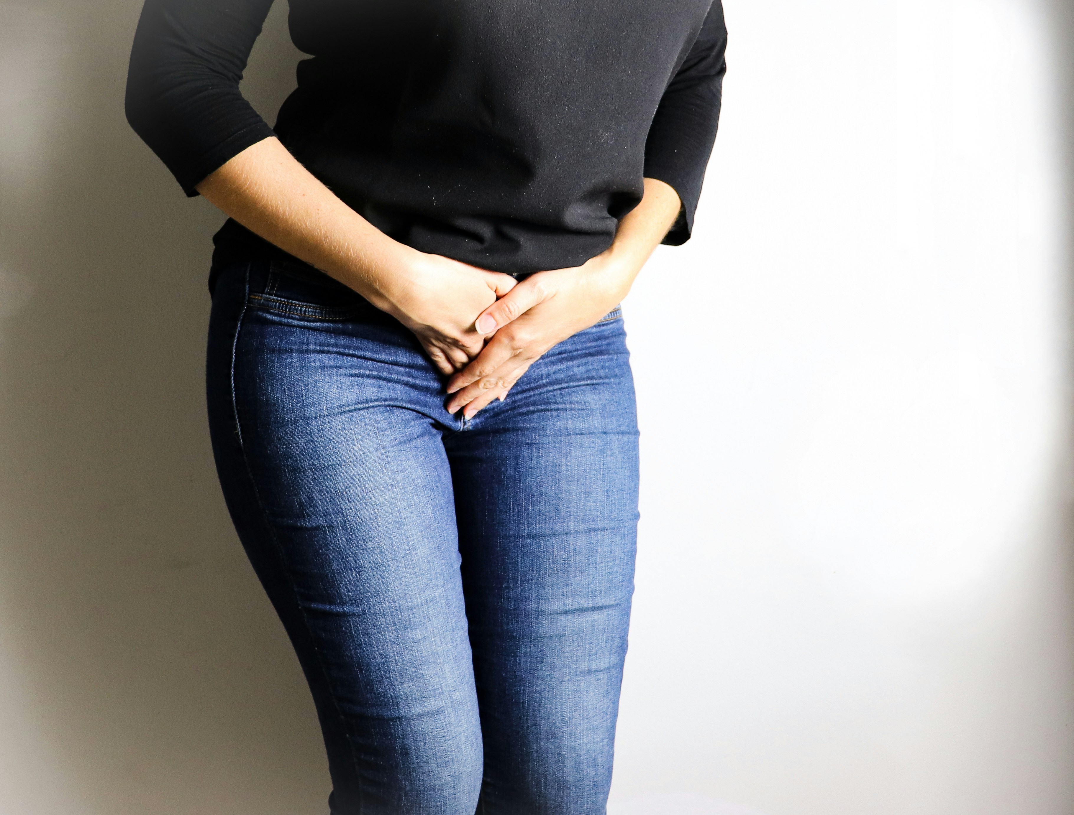 Woman dealing with symptoms of incontinence